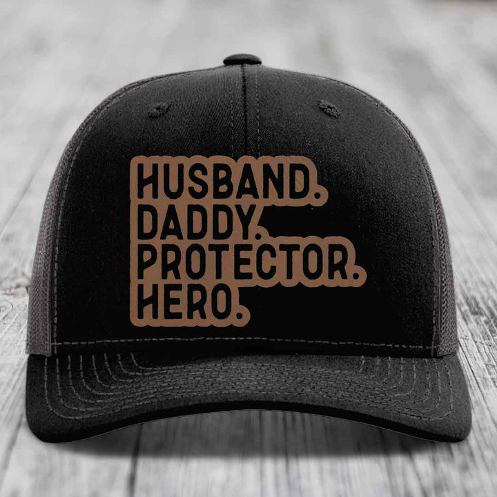Husband Daddy Protector Hero - Leather Patch Hat - Dark Brown to Black Patch - Richardson 112 Snapback Trucker Hat