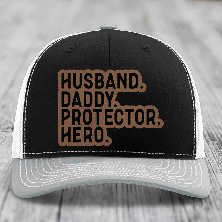 Husband Daddy Protector Hero - Leather Patch Hat - Dark Brown to Black Patch - Richardson 112 Snapback Trucker Hat