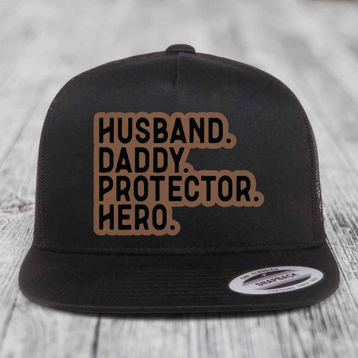 Husband Daddy Protector Hero - Leather Patch Hat - Dark Brown to Black Patch - Yupoong 6006 Snapback Flatbill Hat