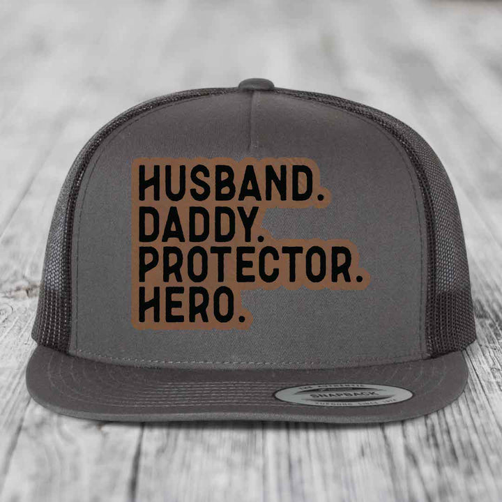 Husband Daddy Protector Hero - Leather Patch Hat - Dark Brown to Black Patch - Yupoong 6006 Snapback Flatbill Hat