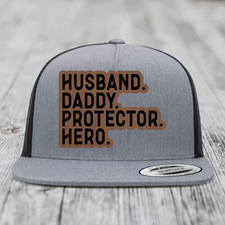Husband Daddy Protector Hero - Leather Patch Hat - Dark Brown to Black Patch - Yupoong 6006 Snapback Flatbill Hat