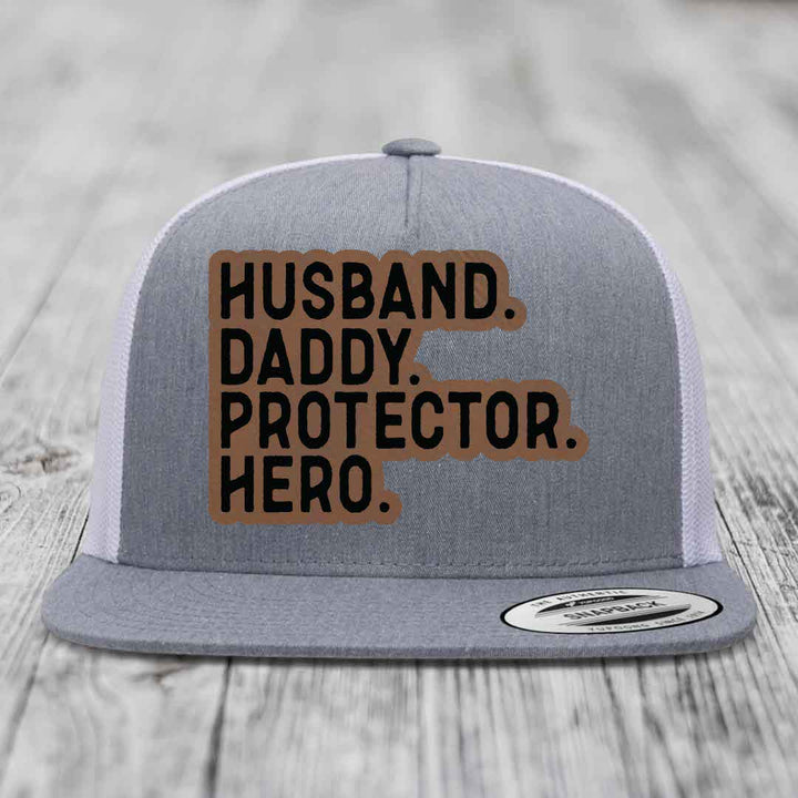 Husband Daddy Protector Hero - Leather Patch Hat - Dark Brown to Black Patch - Yupoong 6006 Snapback Flatbill Hat