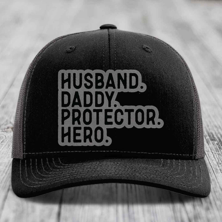 Husband Daddy Protector Hero - Leather Patch Hat - Grey to Black Patch - Richardson 112 Snapback Trucker Hat