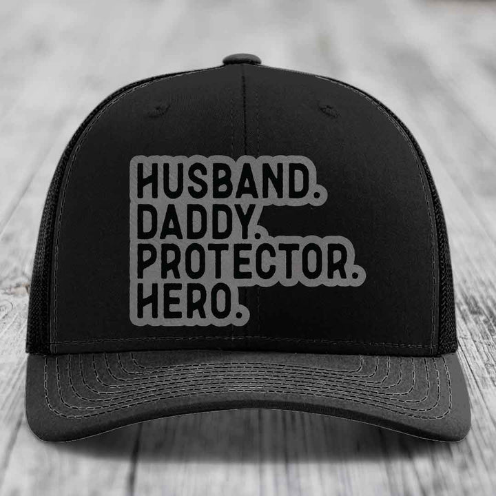 Husband Daddy Protector Hero - Leather Patch Hat - Grey to Black Patch - Richardson 112 Snapback Trucker Hat
