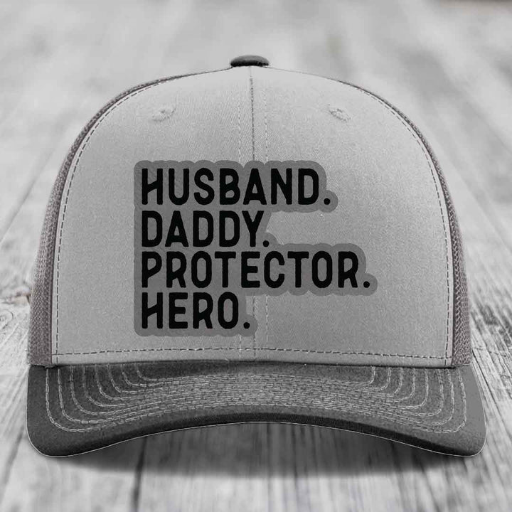 Husband Daddy Protector Hero - Leather Patch Hat - Grey to Black Patch - Richardson 112 Snapback Trucker Hat