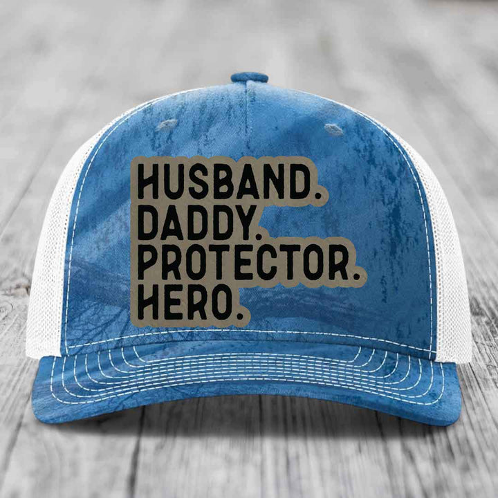 Husband Daddy Protector Hero - Leather Patch Hat - Light Brown to Black Patch - Richardson 112PFP Snapback Trucker Hat
