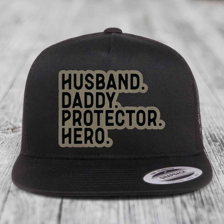 Husband Daddy Protector Hero - Leather Patch Hat - Light Brown to Black Patch - Yupoong 6006 Snapback Flatbill Hat