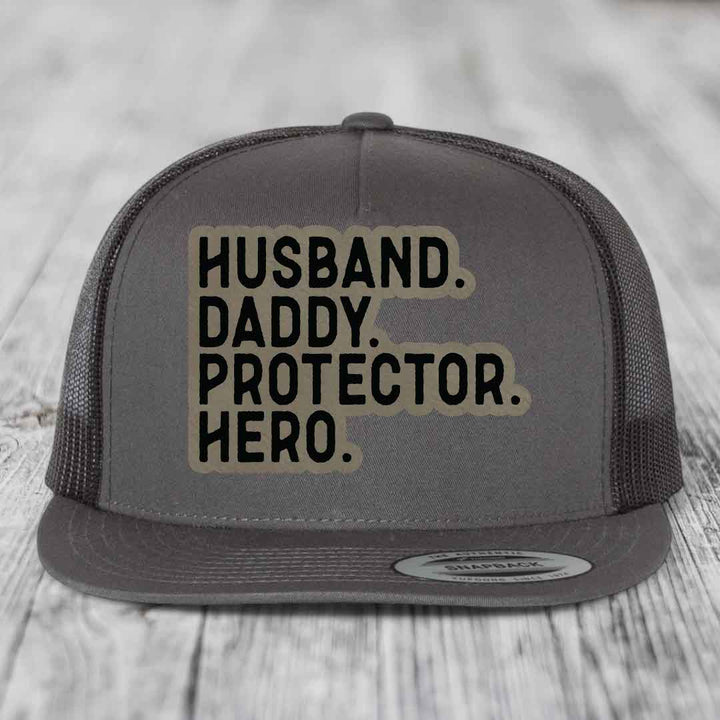 Husband Daddy Protector Hero - Leather Patch Hat - Light Brown to Black Patch - Yupoong 6006 Snapback Flatbill Hat