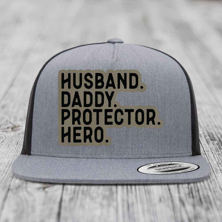Husband Daddy Protector Hero - Leather Patch Hat - Light Brown to Black Patch - Yupoong 6006 Snapback Flatbill Hat