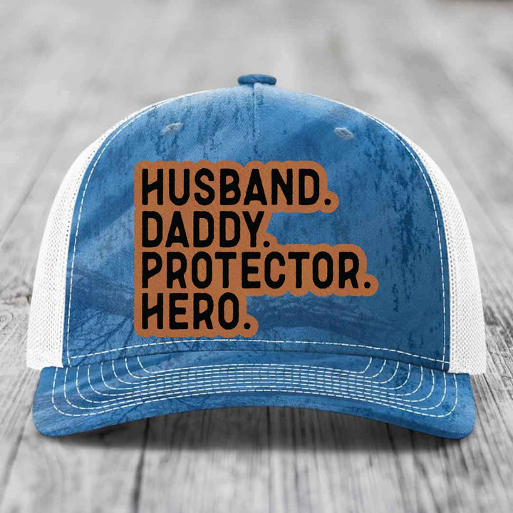 Husband Daddy Protector Hero - Leather Patch Hat - Rawhide to Black Patch - Richardson 112PFP Snapback Trucker Hat