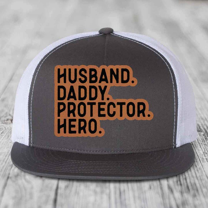 Husband Daddy Protector Hero - Leather Patch Hat - Rawhide to Black Patch - Yupoong 6006 Snapback Flatbill Hat