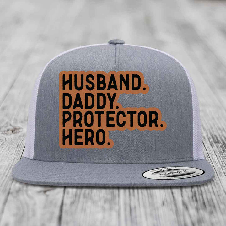 Husband Daddy Protector Hero - Leather Patch Hat - Rawhide to Black Patch - Yupoong 6006 Snapback Flatbill Hat