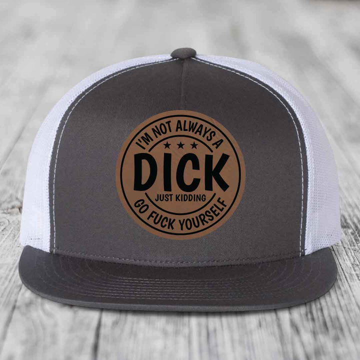 Grey and white trucker hat with a brown leather patch that reads &