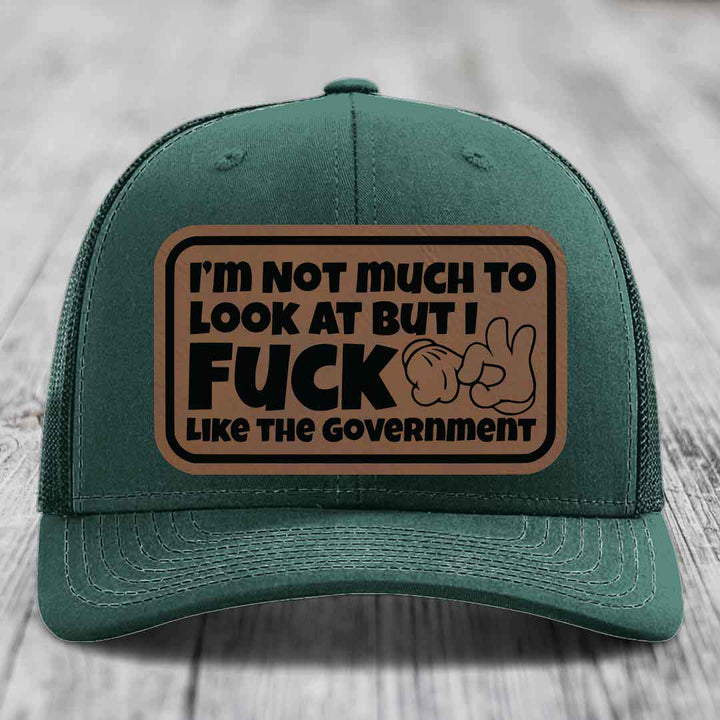 Im Not Much To Look At, But I F*ck Like The Government - Leather Patch Hat - Dark Brown to Black Patch - Richardson 112 Snapback Trucker Hat