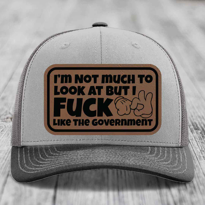 Im Not Much To Look At, But I F*ck Like The Government - Leather Patch Hat - Dark Brown to Black Patch - Richardson 112 Snapback Trucker Hat