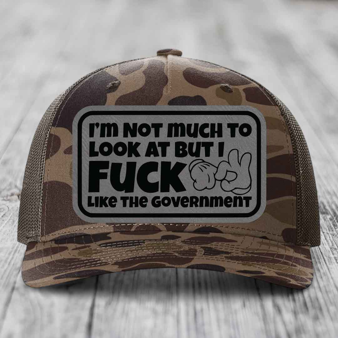 Im Not Much To Look At, But I F*ck Like The Government - Leather Patch Hat - Grey to Black Patch - Richardson 112PFP Snapback Trucker Hat