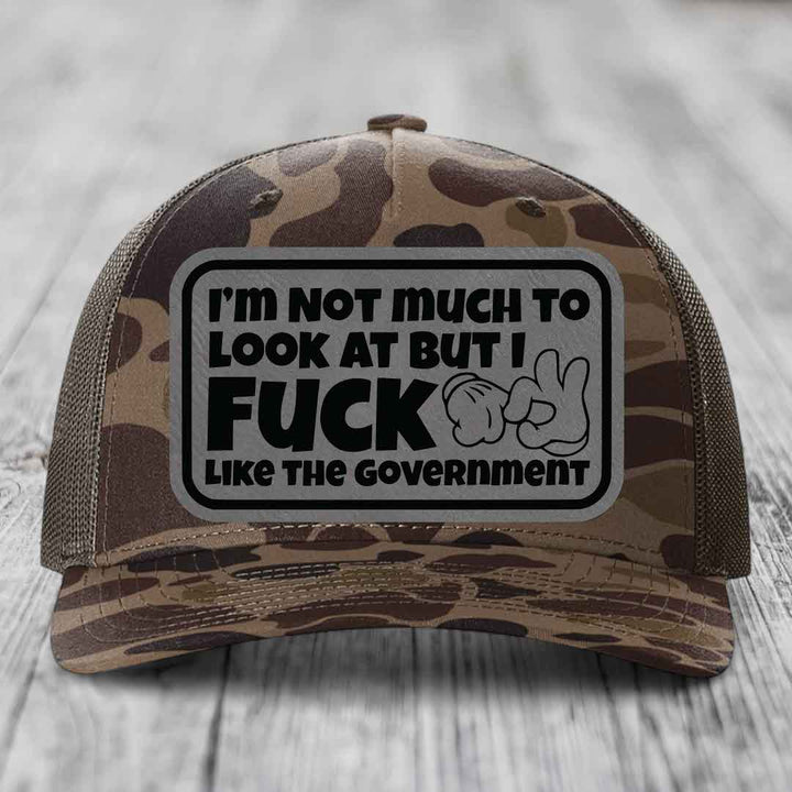 Im Not Much To Look At, But I F*ck Like The Government - Leather Patch Hat - Grey to Black Patch - Richardson 112PFP Snapback Trucker Hat