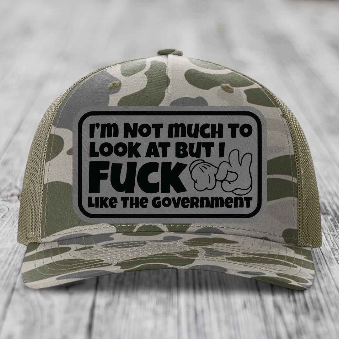 Im Not Much To Look At, But I F*ck Like The Government - Leather Patch Hat - Grey to Black Patch - Richardson 112PFP Snapback Trucker Hat