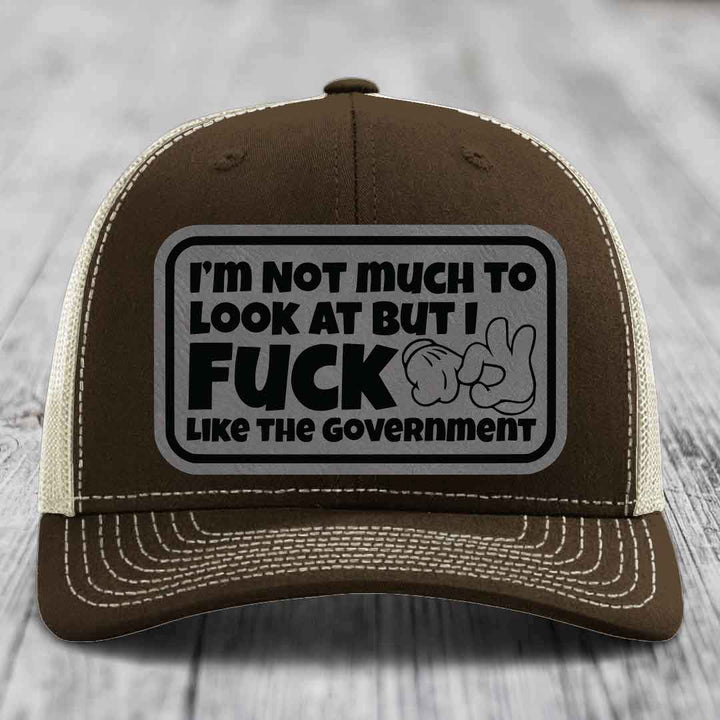 Im Not Much To Look At, But I F*ck Like The Government - Leather Patch Hat - Grey to Black Patch - Richardson 112 Snapback Trucker Hat