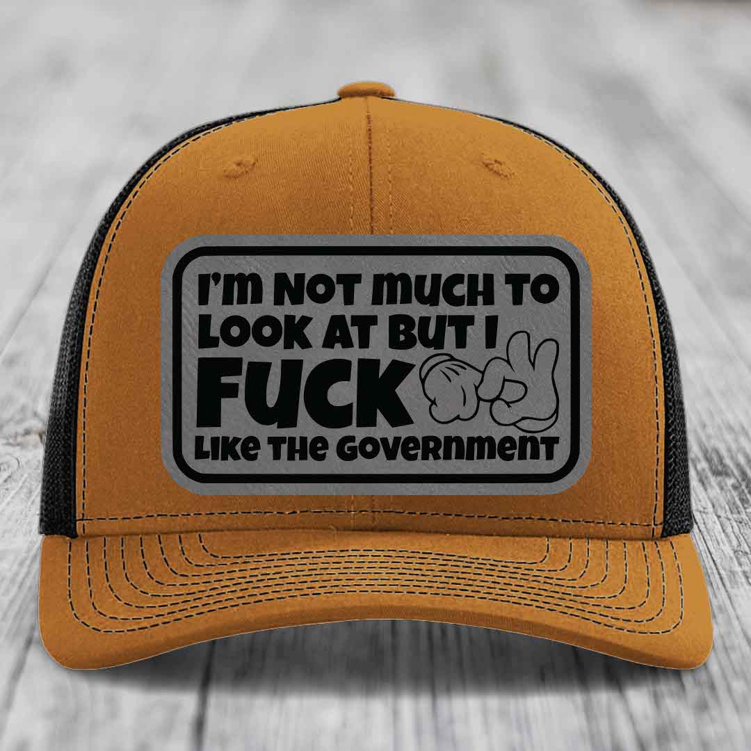Im Not Much To Look At, But I F*ck Like The Government - Leather Patch Hat - Grey to Black Patch - Richardson 112 Snapback Trucker Hat