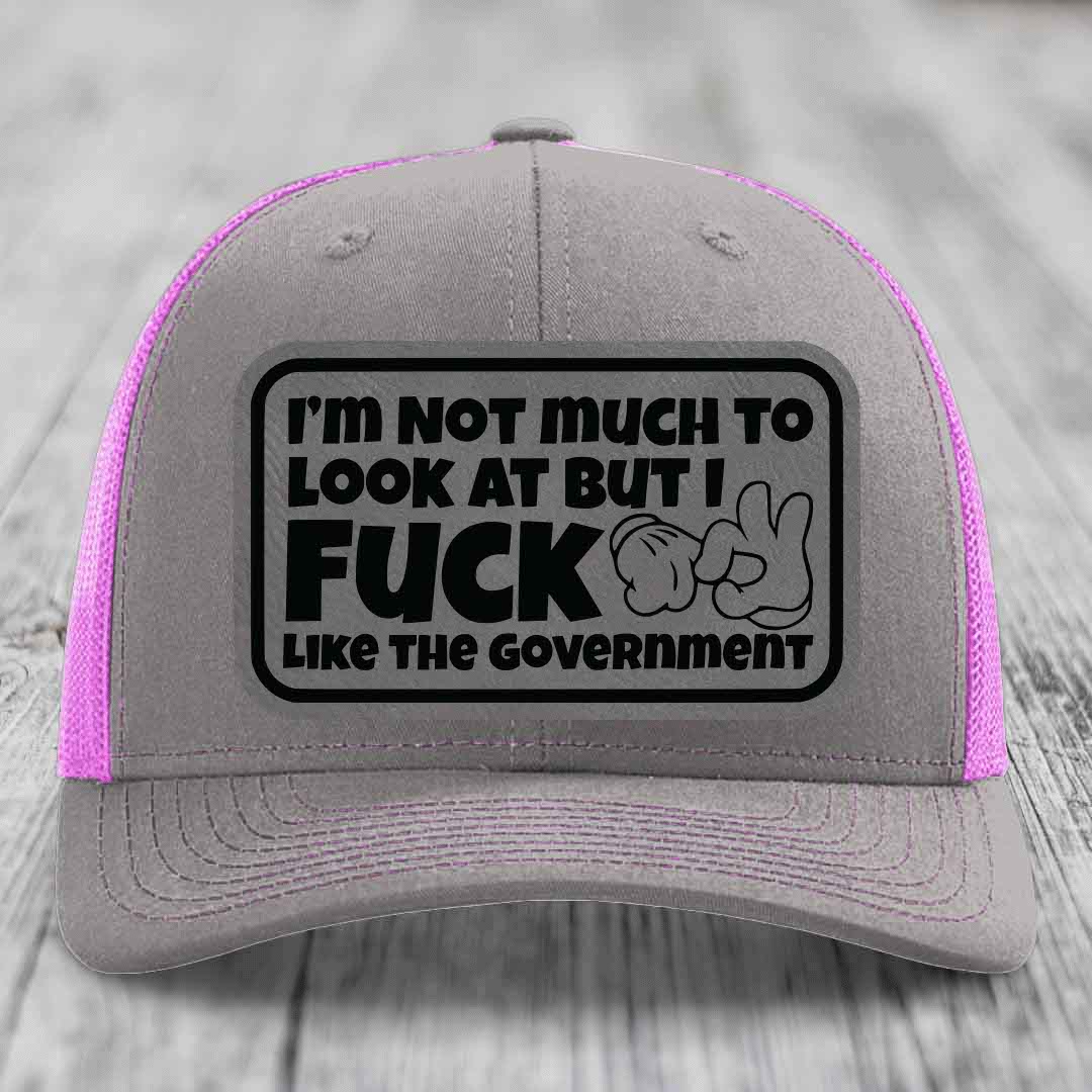Im Not Much To Look At, But I F*ck Like The Government - Leather Patch Hat - Grey to Black Patch - Richardson 112 Snapback Trucker Hat