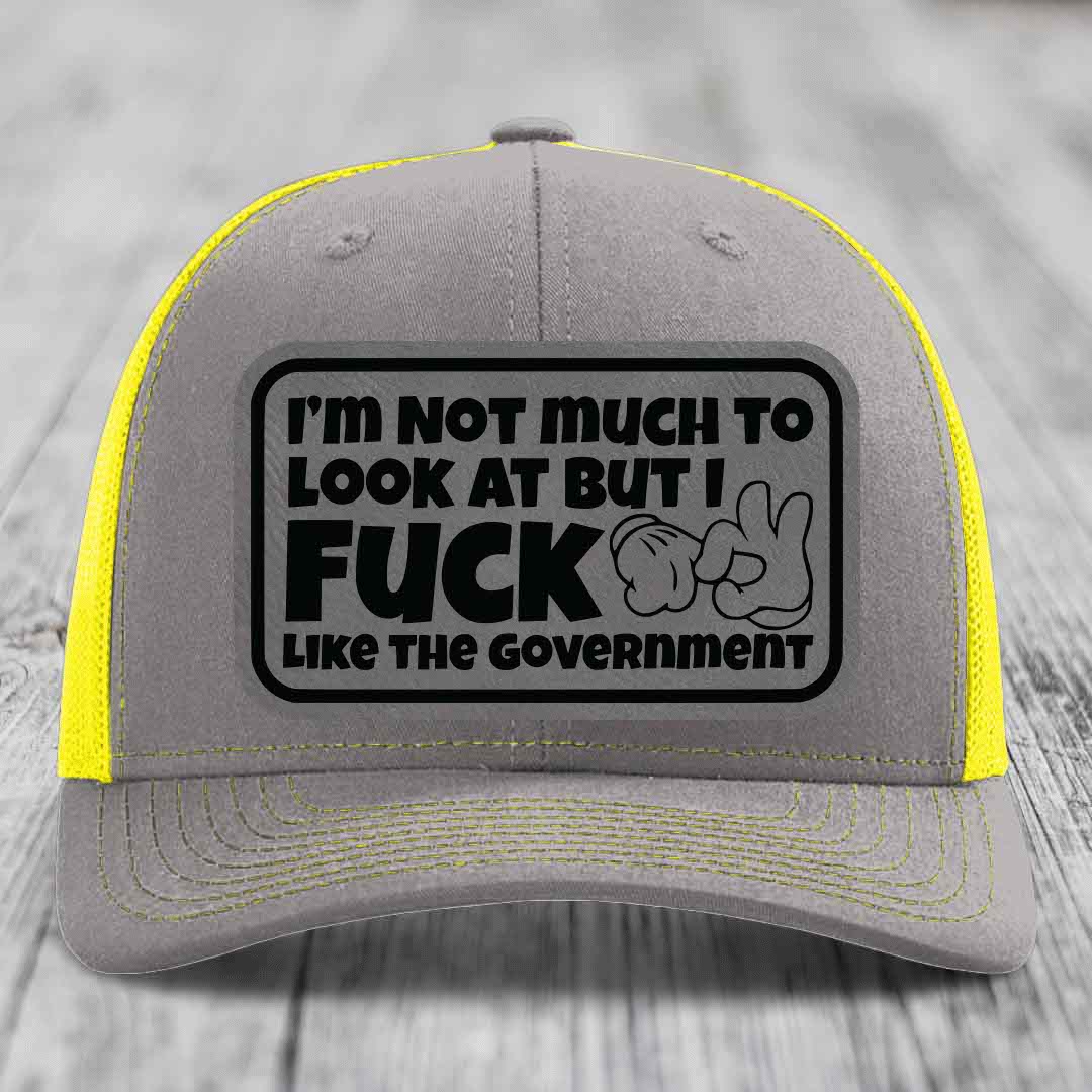Im Not Much To Look At, But I F*ck Like The Government - Leather Patch Hat - Grey to Black Patch - Richardson 112 Snapback Trucker Hat