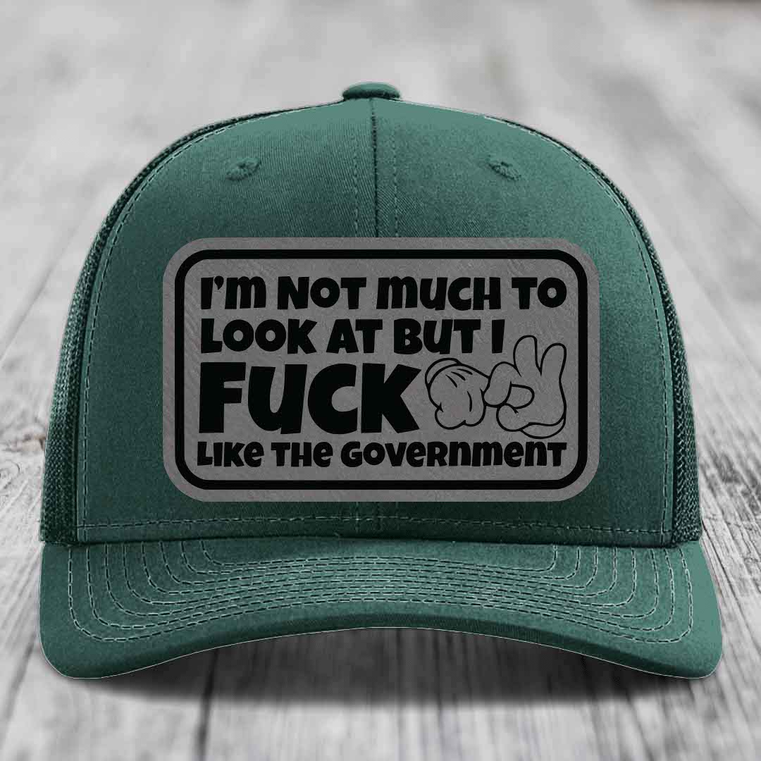 Im Not Much To Look At, But I F*ck Like The Government - Leather Patch Hat - Grey to Black Patch - Richardson 112 Snapback Trucker Hat