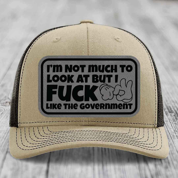Im Not Much To Look At, But I F*ck Like The Government - Leather Patch Hat - Grey to Black Patch - Richardson 112 Snapback Trucker Hat