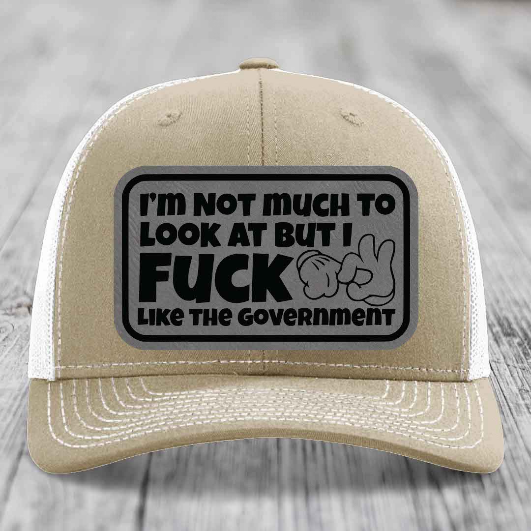 Im Not Much To Look At, But I F*ck Like The Government - Leather Patch Hat - Grey to Black Patch - Richardson 112 Snapback Trucker Hat