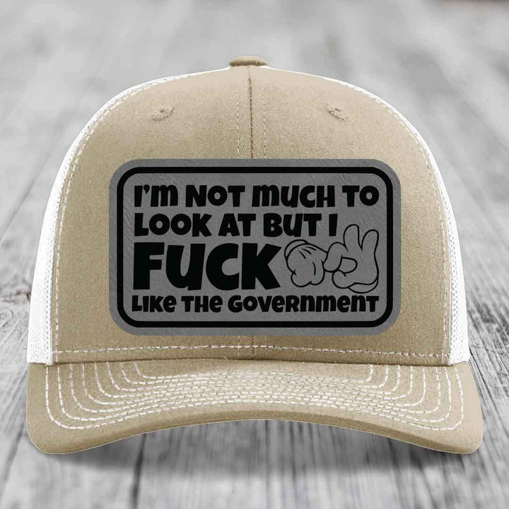 Im Not Much To Look At, But I F*ck Like The Government - Leather Patch Hat - Grey to Black Patch - Richardson 112 Snapback Trucker Hat