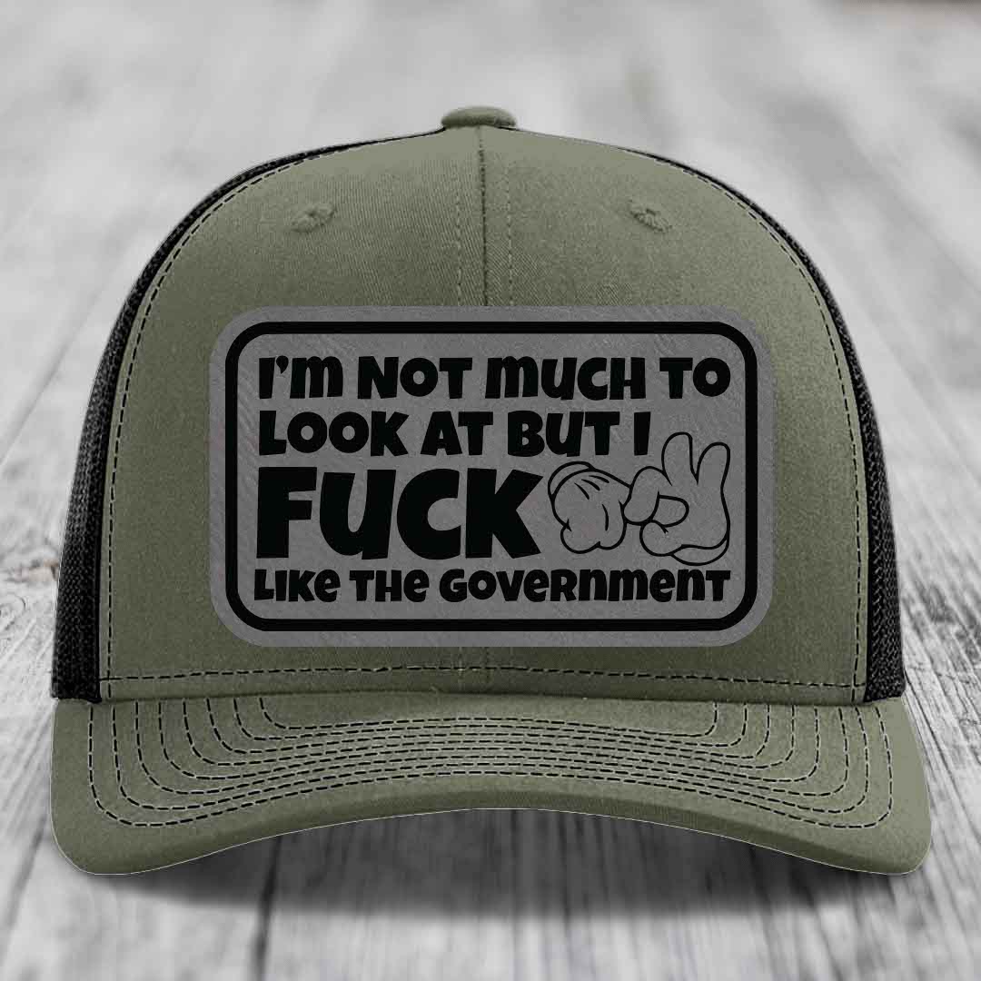 Im Not Much To Look At, But I F*ck Like The Government - Leather Patch Hat - Grey to Black Patch - Richardson 112 Snapback Trucker Hat
