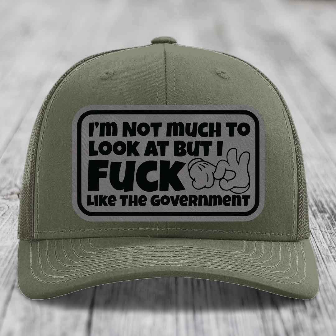 Im Not Much To Look At, But I F*ck Like The Government - Leather Patch Hat - Grey to Black Patch - Richardson 112 Snapback Trucker Hat