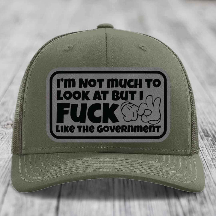 Im Not Much To Look At, But I F*ck Like The Government - Leather Patch Hat - Grey to Black Patch - Richardson 112 Snapback Trucker Hat