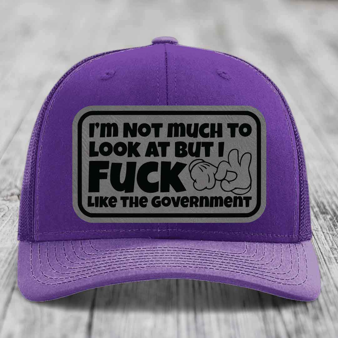 Im Not Much To Look At, But I F*ck Like The Government - Leather Patch Hat - Grey to Black Patch - Richardson 112 Snapback Trucker Hat
