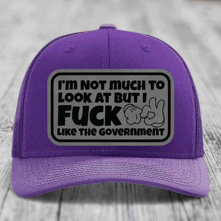 Im Not Much To Look At, But I F*ck Like The Government - Leather Patch Hat - Grey to Black Patch - Richardson 112 Snapback Trucker Hat