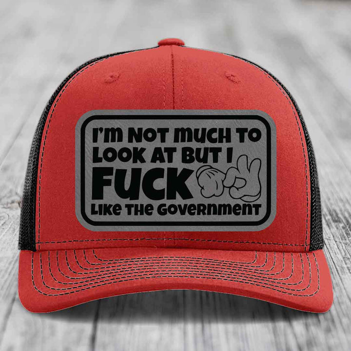 Im Not Much To Look At, But I F*ck Like The Government - Leather Patch Hat - Grey to Black Patch - Richardson 112 Snapback Trucker Hat