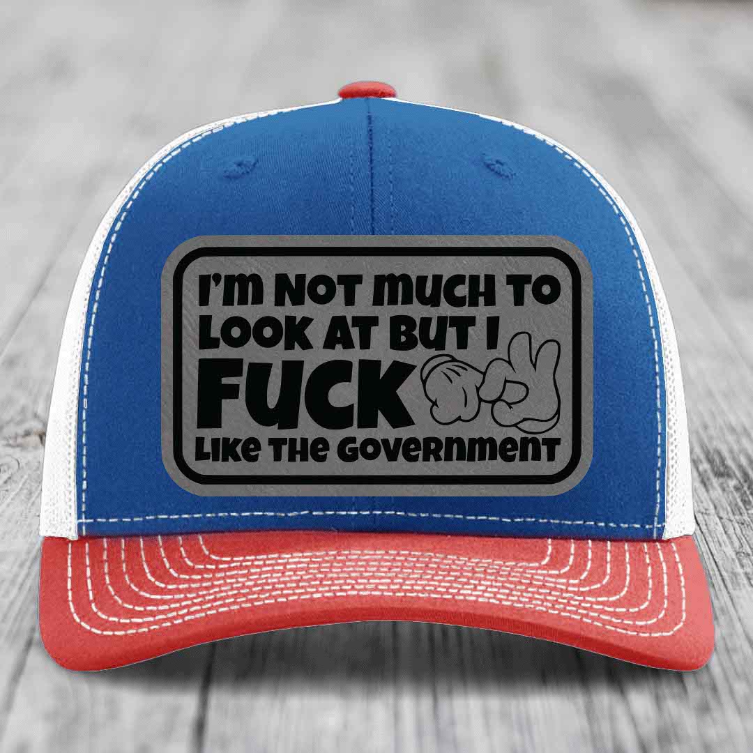 Im Not Much To Look At, But I F*ck Like The Government - Leather Patch Hat - Grey to Black Patch - Richardson 112 Snapback Trucker Hat