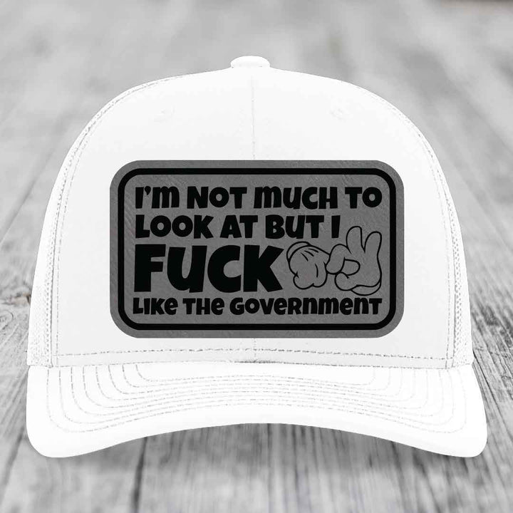 Im Not Much To Look At, But I F*ck Like The Government - Leather Patch Hat - Grey to Black Patch - Richardson 112 Snapback Trucker Hat
