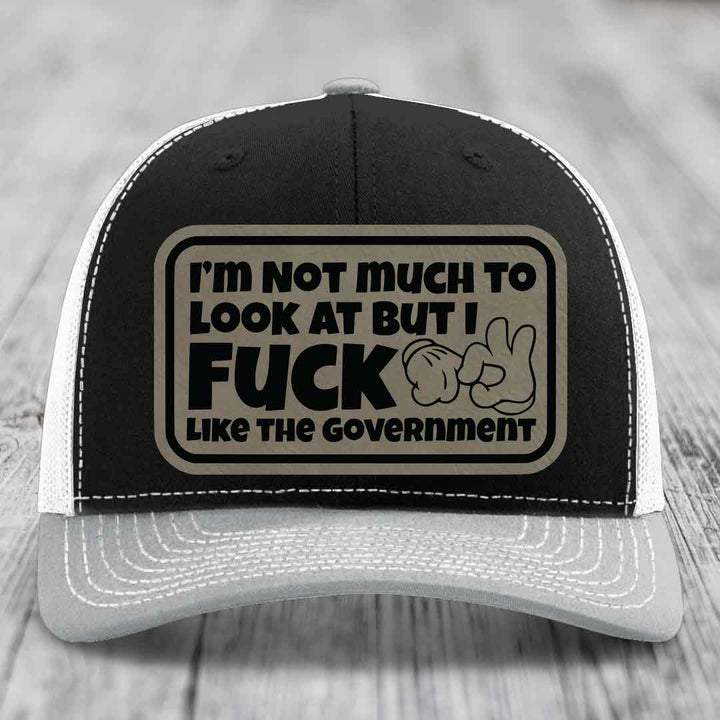 Im Not Much To Look At, But I F*ck Like The Government - Leather Patch Hat - Light Brown to Black Patch - Richardson 112 Snapback Trucker Hat
