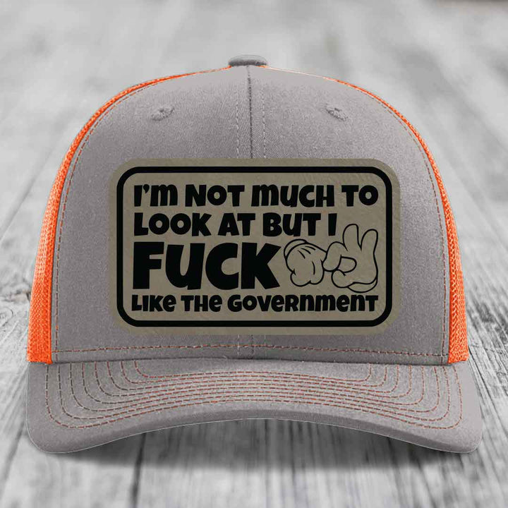 Im Not Much To Look At, But I F*ck Like The Government - Leather Patch Hat - Light Brown to Black Patch - Richardson 112 Snapback Trucker Hat