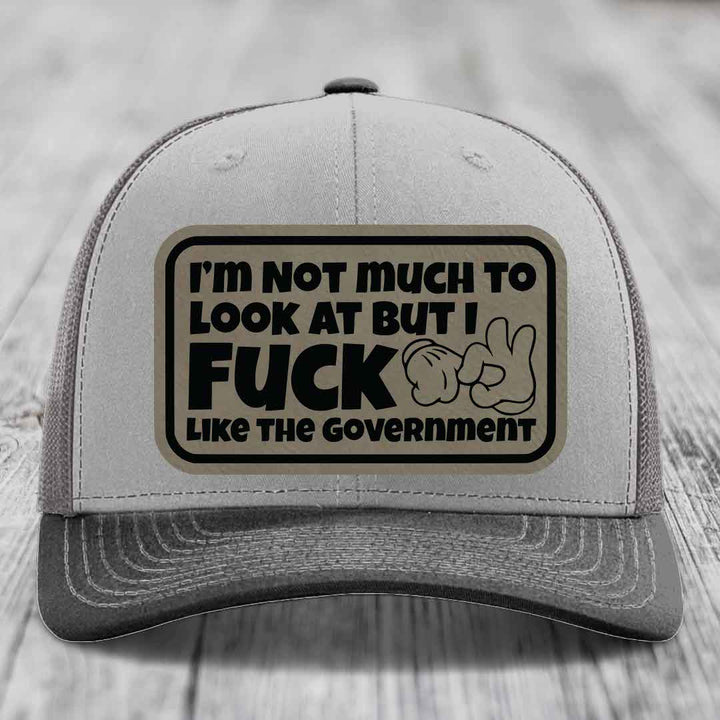 Im Not Much To Look At, But I F*ck Like The Government - Leather Patch Hat - Light Brown to Black Patch - Richardson 112 Snapback Trucker Hat