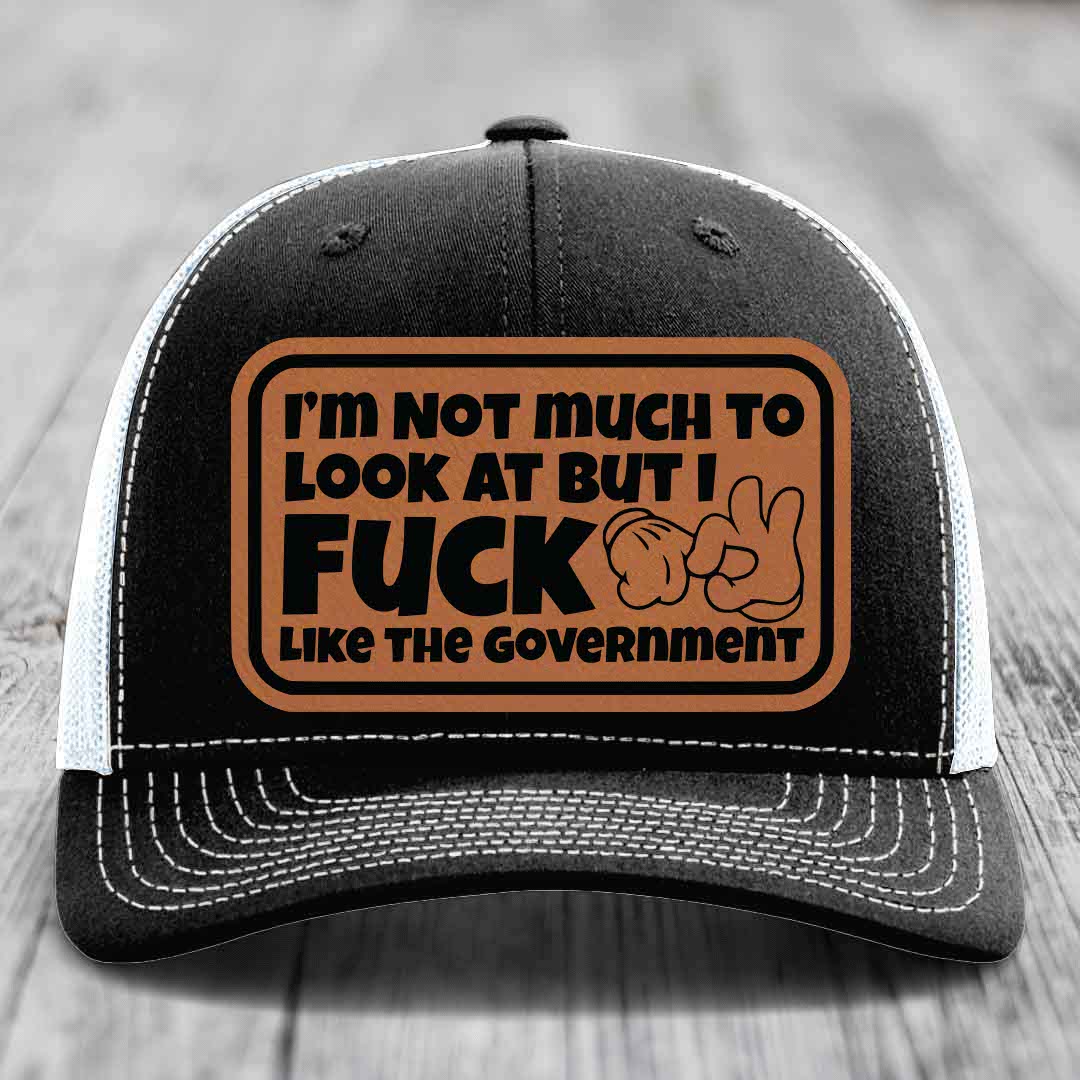 Im Not Much To Look At, But I F*ck Like The Government - Leather Patch Hat - Rawhide to Black Patch - Richardson 112 Snapback Trucker Hat