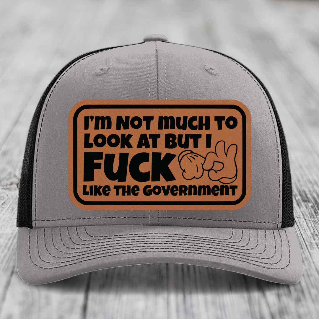 Im Not Much To Look At, But I F*ck Like The Government - Leather Patch Hat - Rawhide to Black Patch - Richardson 112 Snapback Trucker Hat