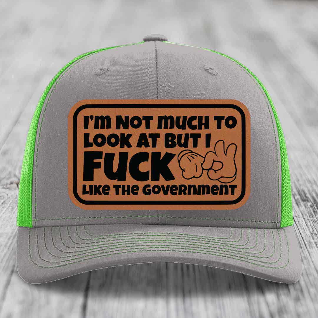 Im Not Much To Look At, But I F*ck Like The Government - Leather Patch Hat - Rawhide to Black Patch - Richardson 112 Snapback Trucker Hat