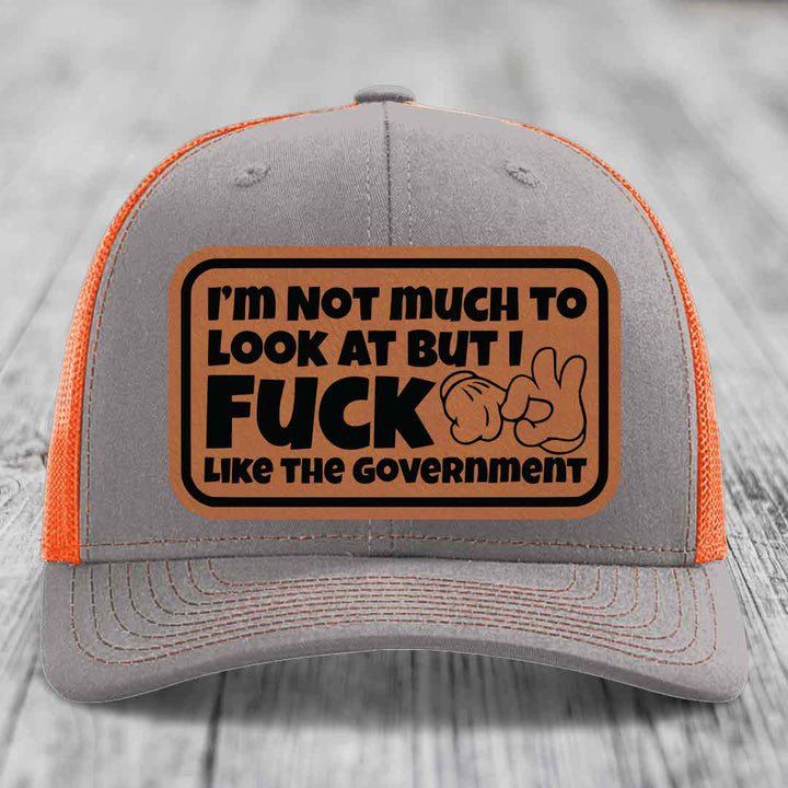 Im Not Much To Look At, But I F*ck Like The Government - Leather Patch Hat - Rawhide to Black Patch - Richardson 112 Snapback Trucker Hat