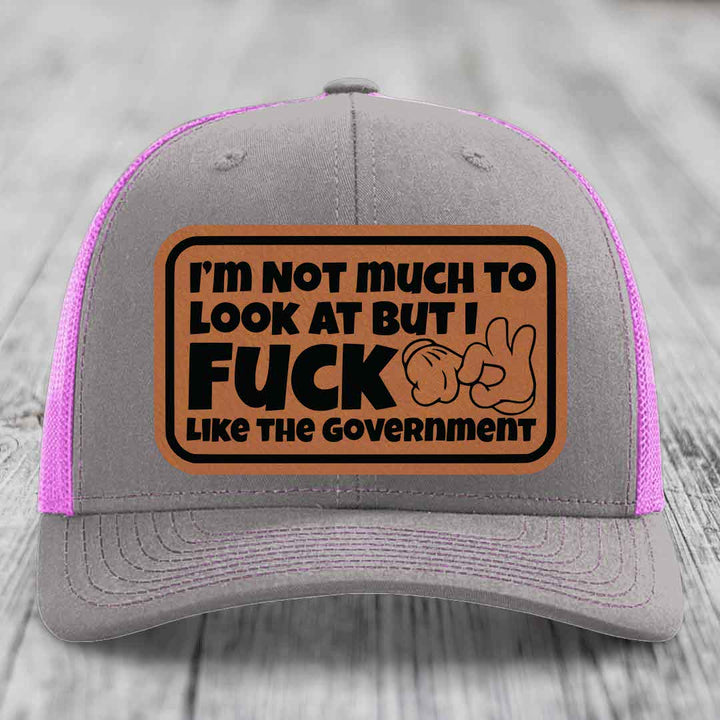 Im Not Much To Look At, But I F*ck Like The Government - Leather Patch Hat - Rawhide to Black Patch - Richardson 112 Snapback Trucker Hat