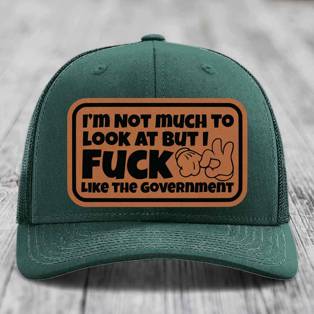 Im Not Much To Look At, But I F*ck Like The Government - Leather Patch Hat - Rawhide to Black Patch - Richardson 112 Snapback Trucker Hat
