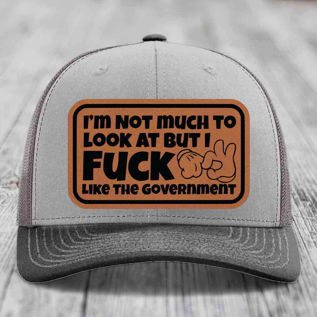 Im Not Much To Look At, But I F*ck Like The Government - Leather Patch Hat - Rawhide to Black Patch - Richardson 112 Snapback Trucker Hat