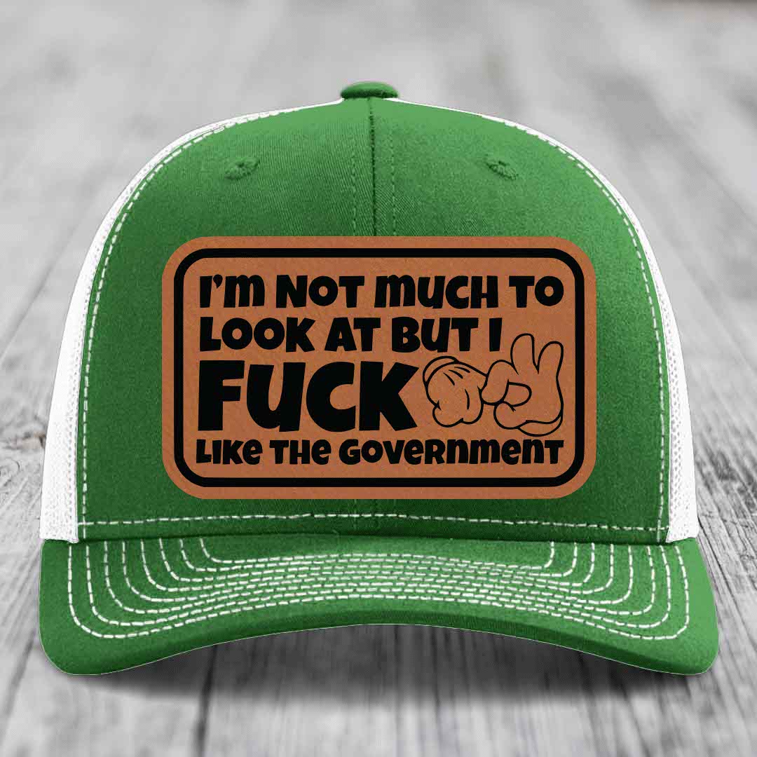Im Not Much To Look At, But I F*ck Like The Government - Leather Patch Hat - Rawhide to Black Patch - Richardson 112 Snapback Trucker Hat