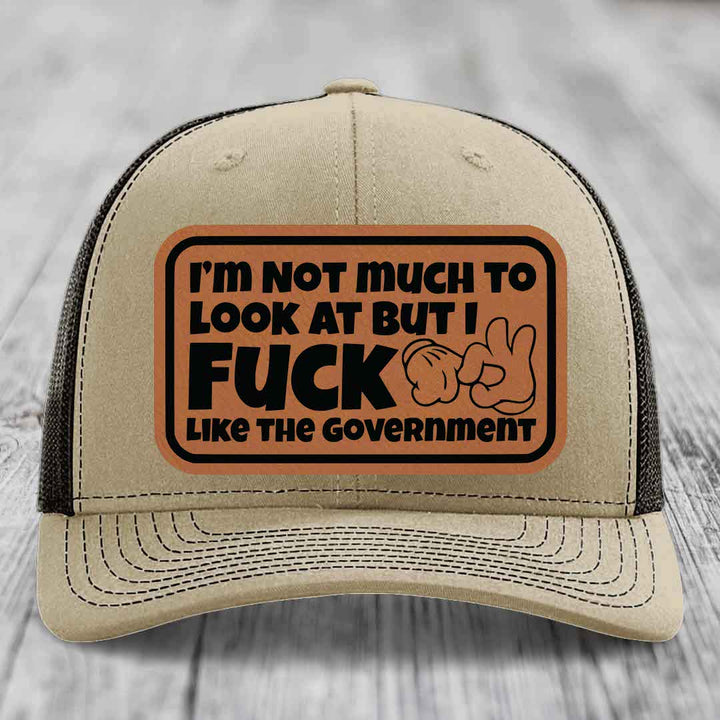 Im Not Much To Look At, But I F*ck Like The Government - Leather Patch Hat - Rawhide to Black Patch - Richardson 112 Snapback Trucker Hat